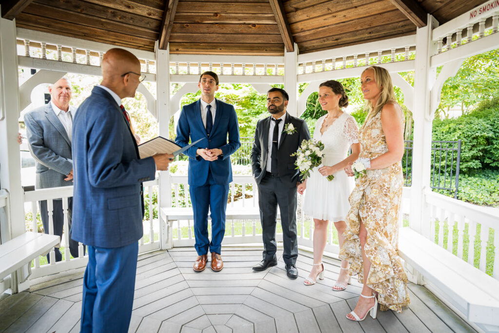 Complete courthouse wedding ceremony at Bergen County gazebo photographed by Alex Kaplan