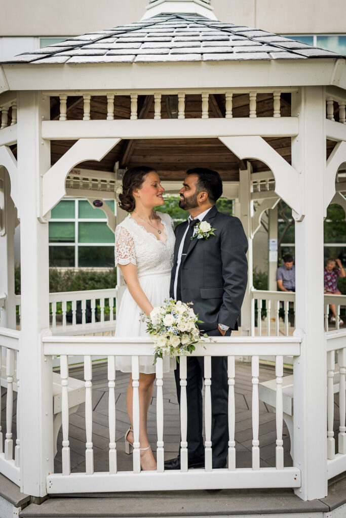 Ring exchange ceremony moment at Bergen County courthouse gazebo by Alex Kaplan photographer