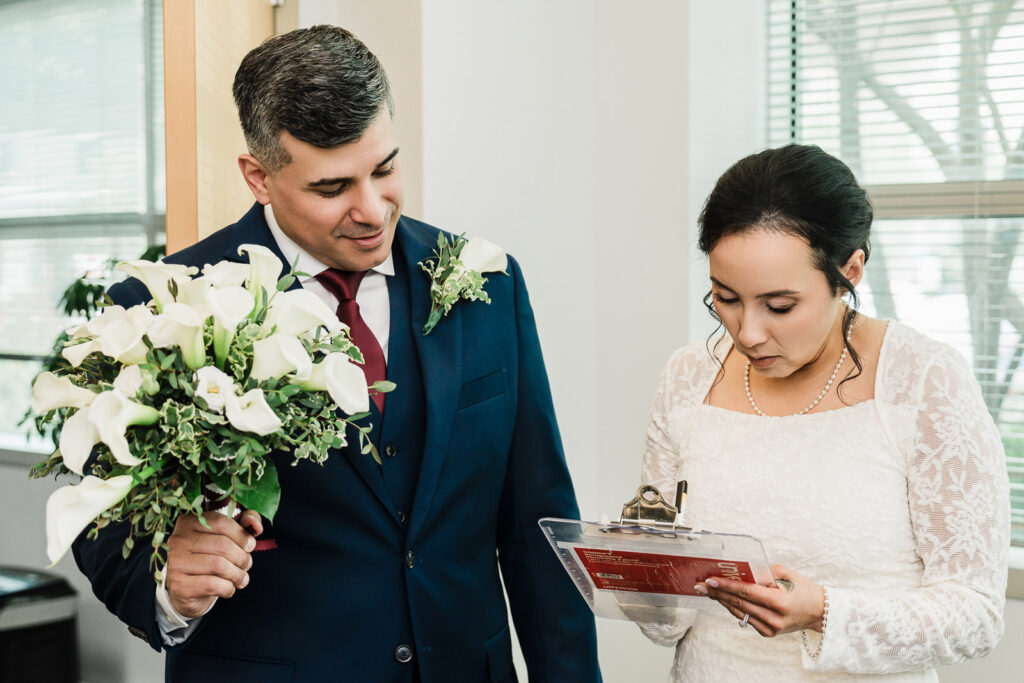 Groom's reaction during first look at Bergen County courthouse gazebo photographed by Alex Kaplan