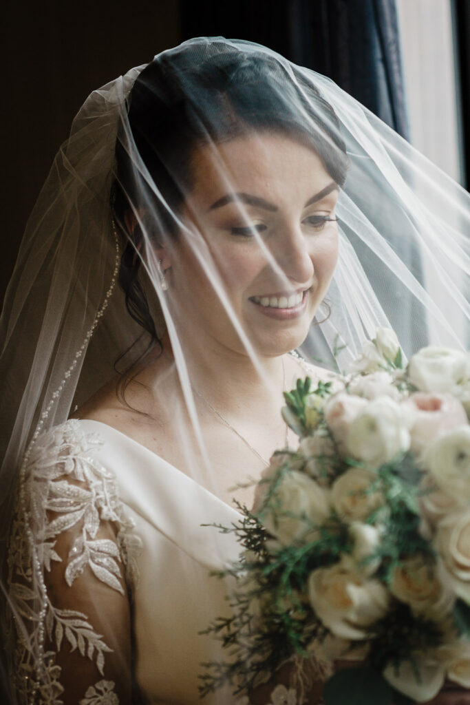 Bride portrait with veil by Alex Kaplan Photography