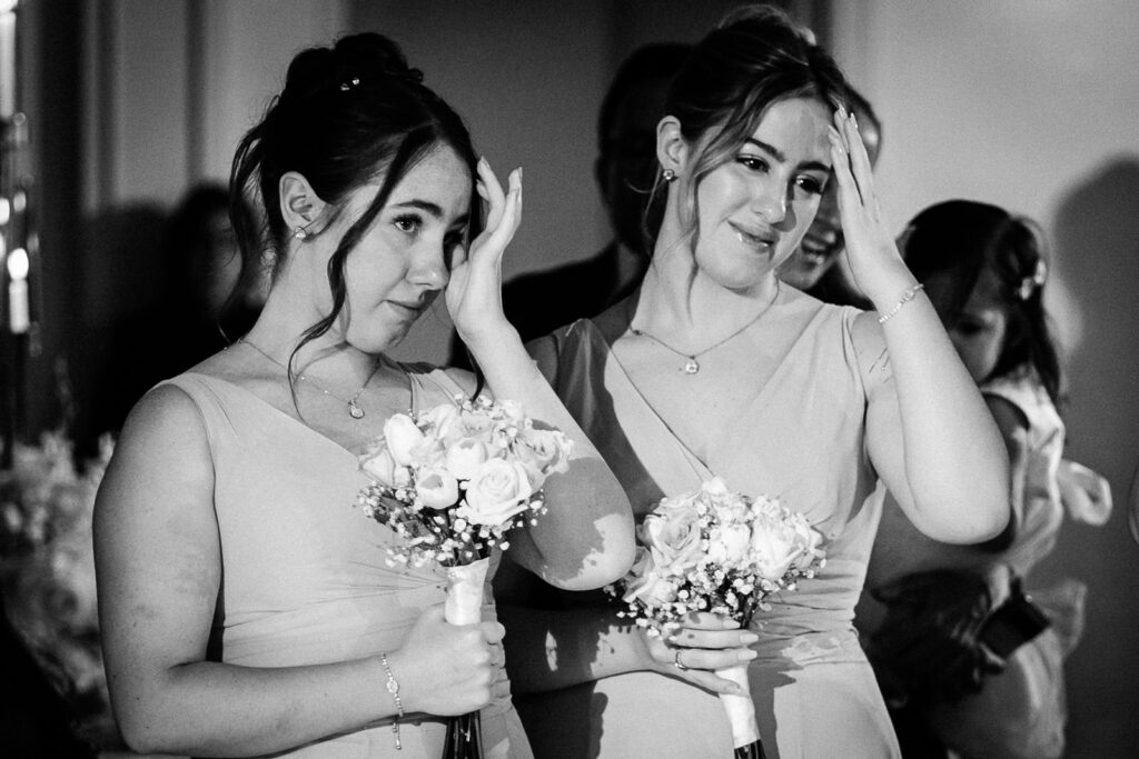 Bridesmaids emotional reaction black and white photography The Grand Totowa NJ wedding
