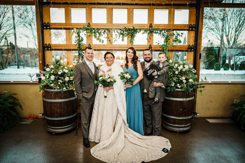 Bride and groom with maid of honor and best man at The Conservatory Sussex County Fairgrounds by Alex Kaplan Photography