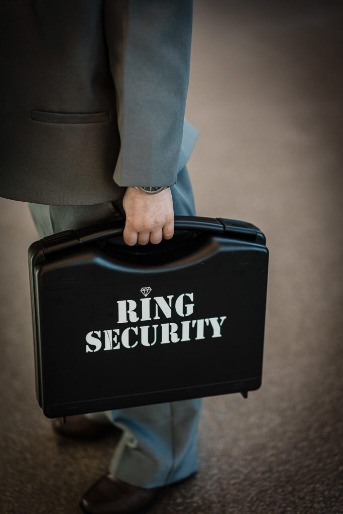 Ring Security briefcase detail at The Conservatory at Sussex County Fairgrounds winter wedding by Alex Kaplan Photography