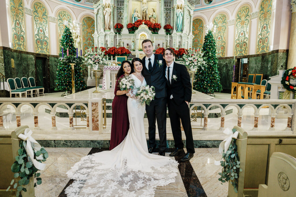 Couple portrait at ornate church altar by Alex Kaplan Photography