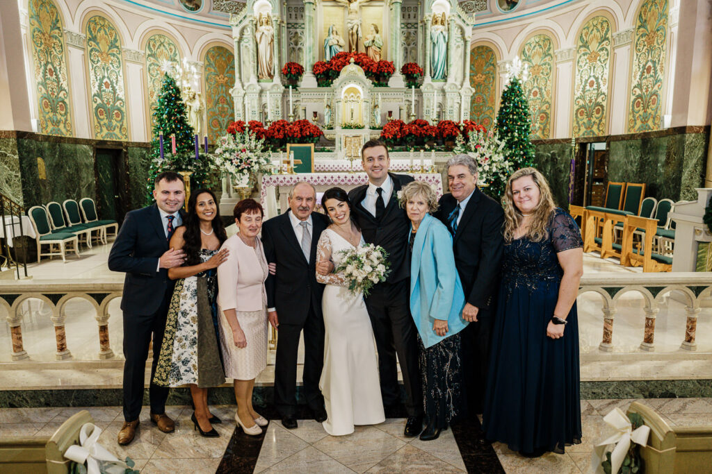 Couple with maid of honor and best man at St. Hedwig Church by Alex Kaplan