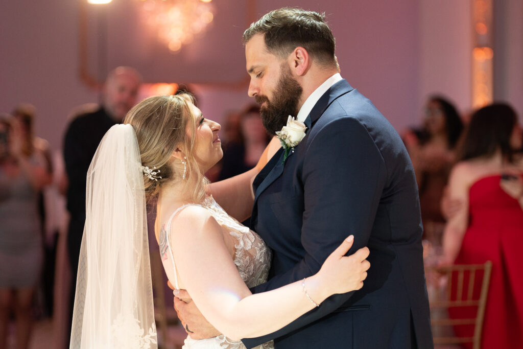 Bride and groom during romantic first dance with atmospheric lighting at Lucien's Manor photographed by Alex Kaplan Photography