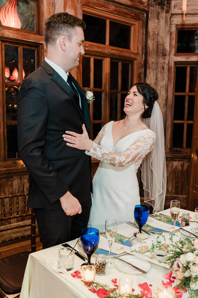 Couple at reception table at Rat's Restaurant by Alex Kaplan Photography