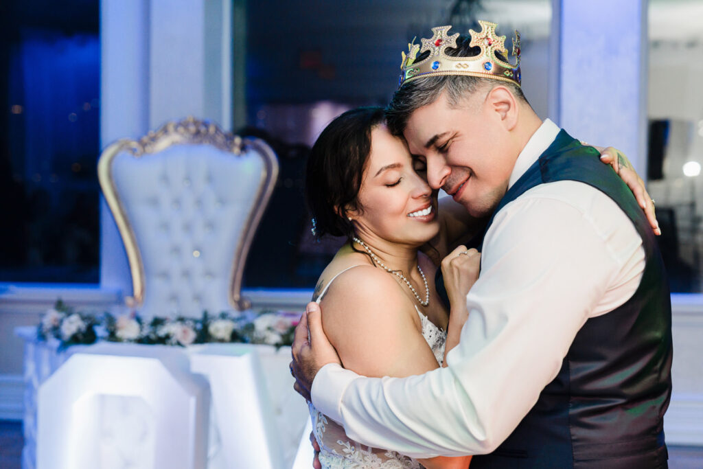Romantic couple portrait during blue hour at Waterside Restaurant by Bergen County courthouse wedding photographer Alex Kaplan
