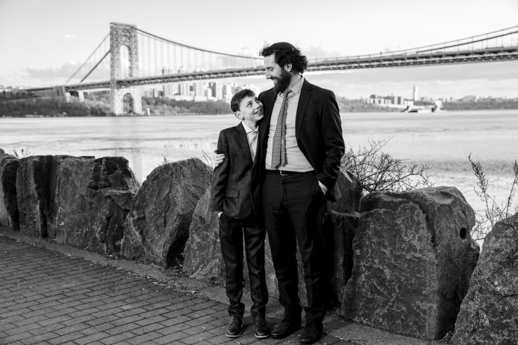 Father and son portrait with George Washington Bridge at Ross Dock
