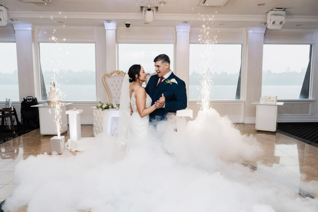 Dramatic first dance photo with special effects at Waterside wedding by Alex Kaplan Photography