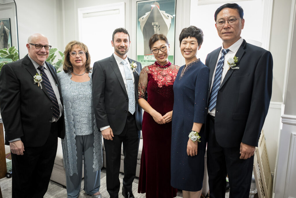 Traditional tea ceremony serving parents at Fair Lawn wedding