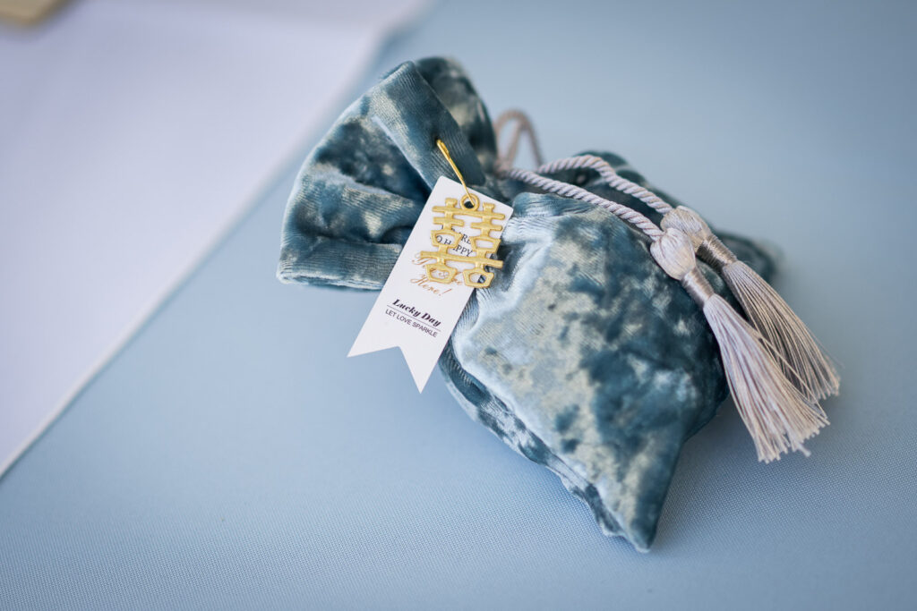 Chinese double happiness favor bags at Fair Lawn NJ backyard wedding