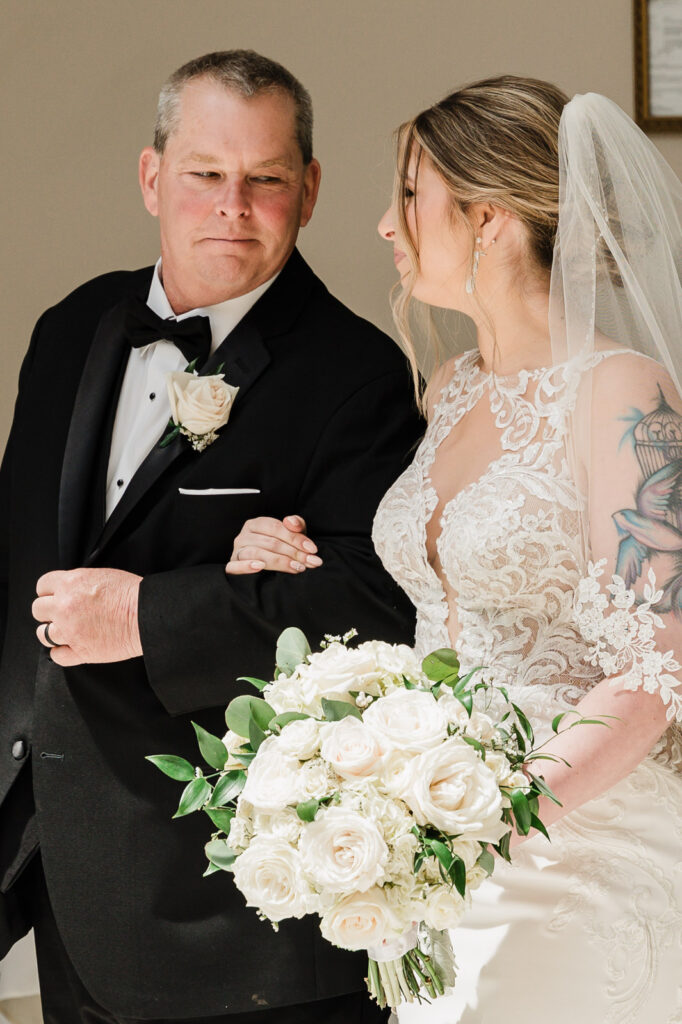Emotional father-daughter first look moment at Westin Mount Laurel photographed by Bergen County wedding photographer Alex Kaplan