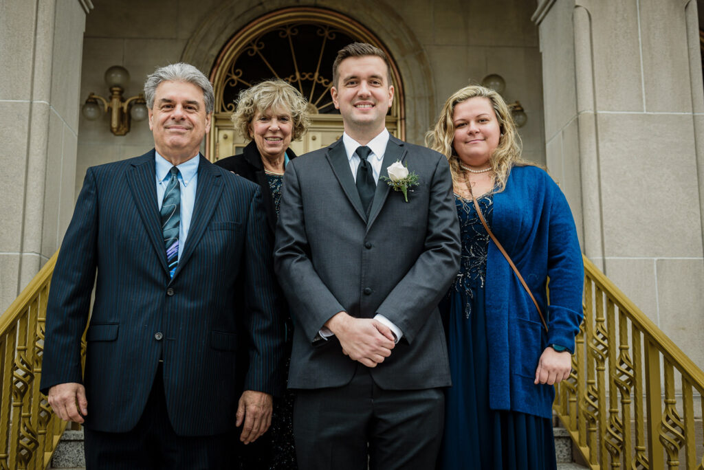 Groom portrait outside St. Hedwig Roman Catholic Church in Trenton by Alex Kaplan