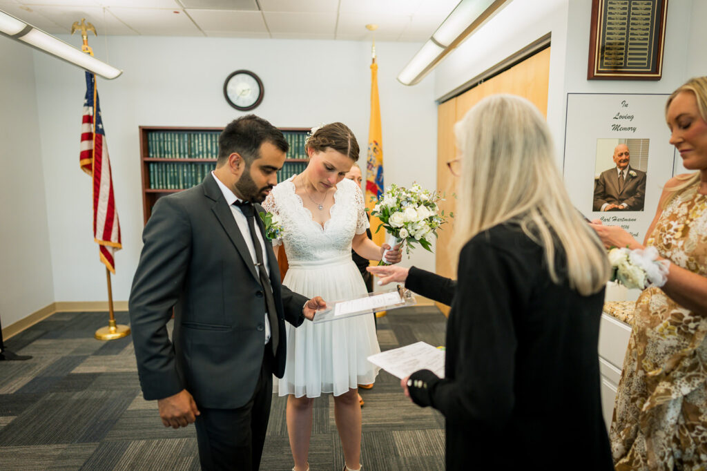 Intimate courthouse ceremony with officiant and family at Bergen County by Alex Kaplan
