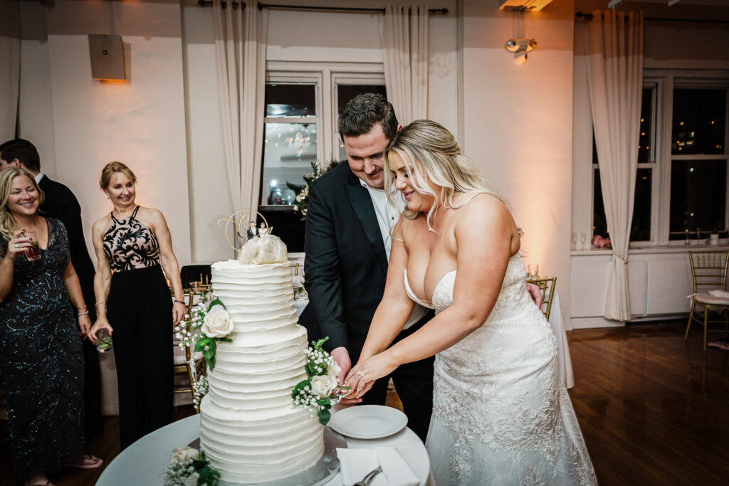 Cake cutting at Midtown Loft & Terrace winter wedding reception NYC