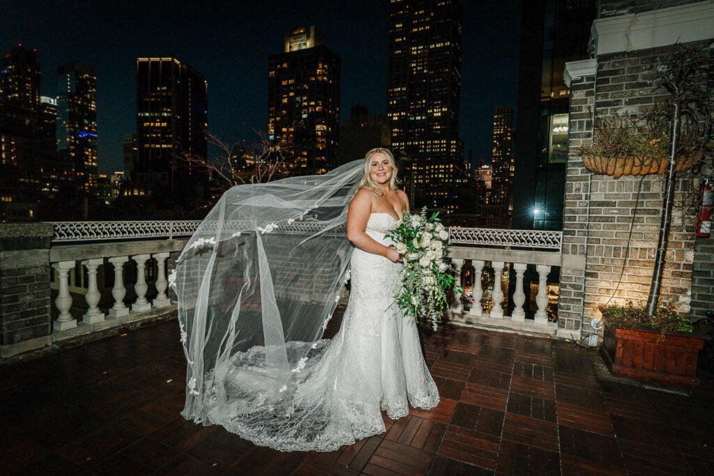 Bride's veil on Midtown Loft & Terrace rooftop with Manhattan skyline