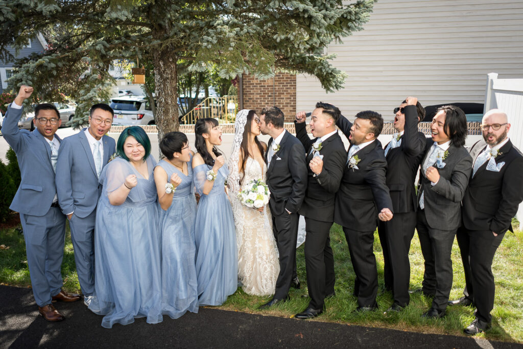 Bridal party celebrates couple's kiss at NJ backyard wedding