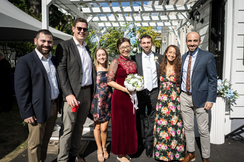 Both families together after Chinese tea ceremony at NJ home wedding