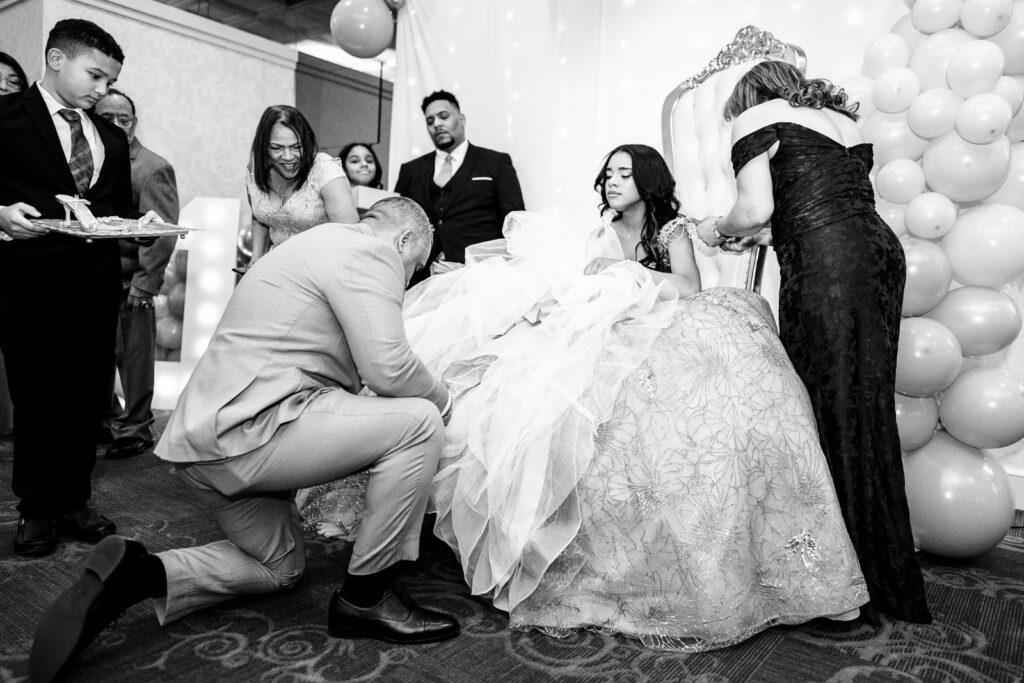 Traditional shoe ceremony at Winter Wonderland Sweet Sixteen The Elan Lodi NJ