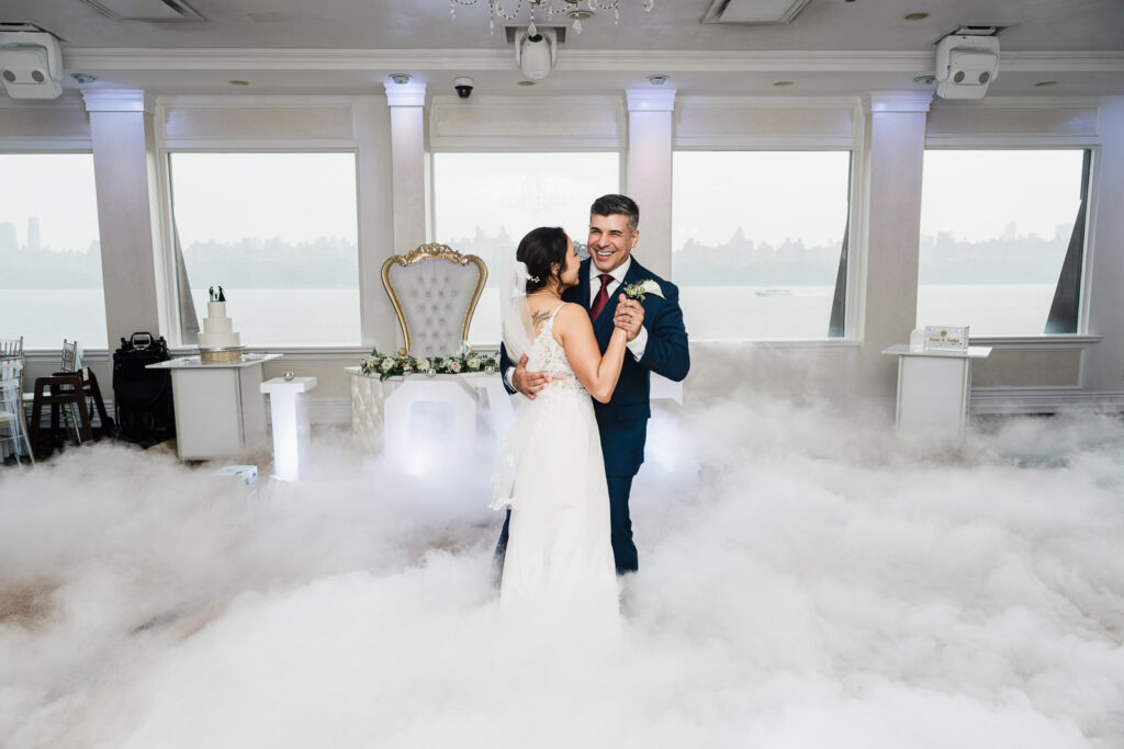 Couple's first dance with fog and sparklers at Waterside Restaurant by Bergen County photographer Alex Kaplan