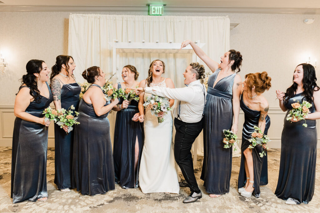Bridesmaids in navy gowns group portrait Windsor Ballroom East Windsor
