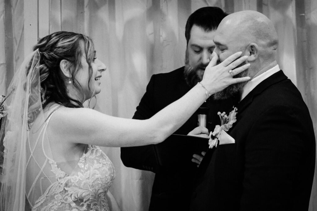 Emotional ceremony moment bride touching groom face Windsor Ballroom East Windsor