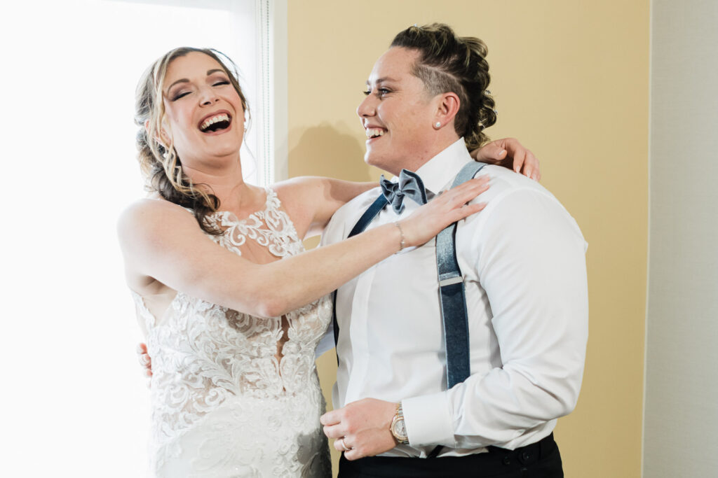 Bride laughing during first look Windsor Ballroom East Windsor