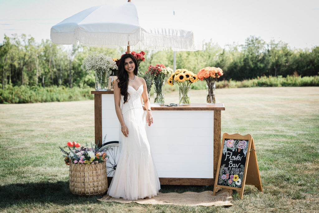 Custom flower bar with sunflowers and roses at Somerset engagement celebration