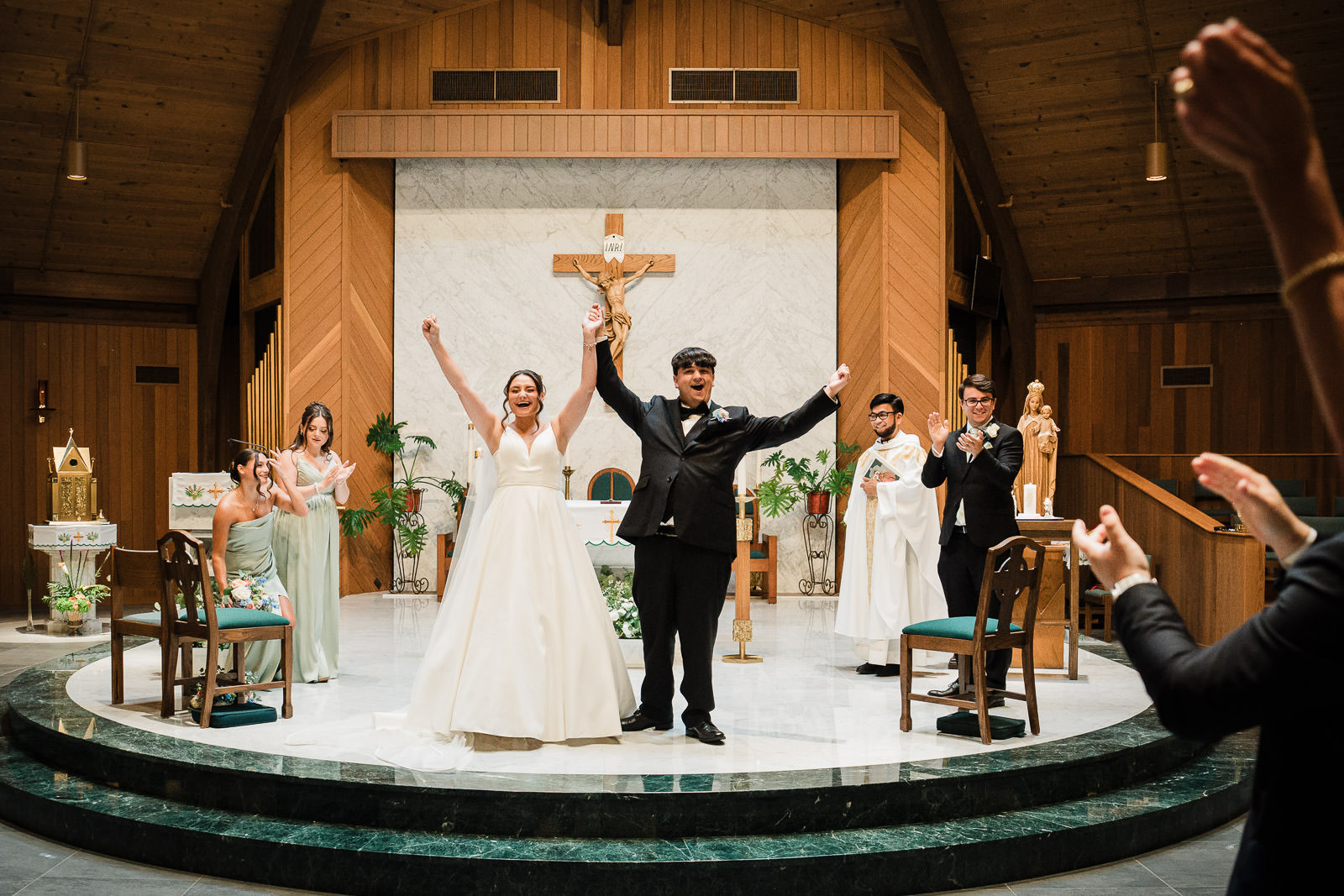 Just married couple celebrating recessional at Northern New Jersey wedding ceremony