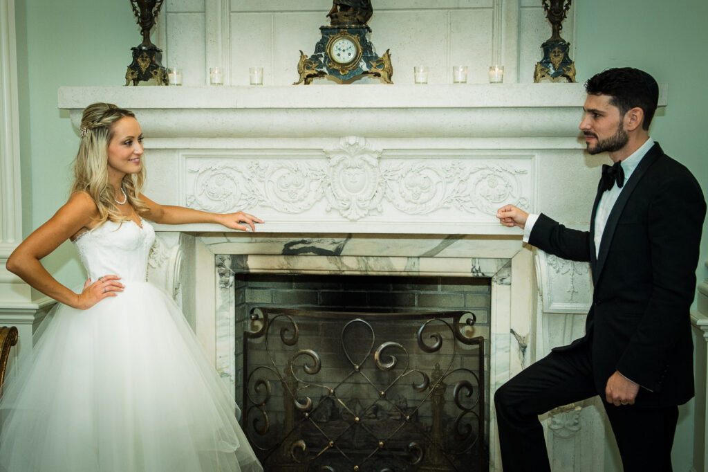 Bride groom formal portrait fireplace Rockleigh Country Club