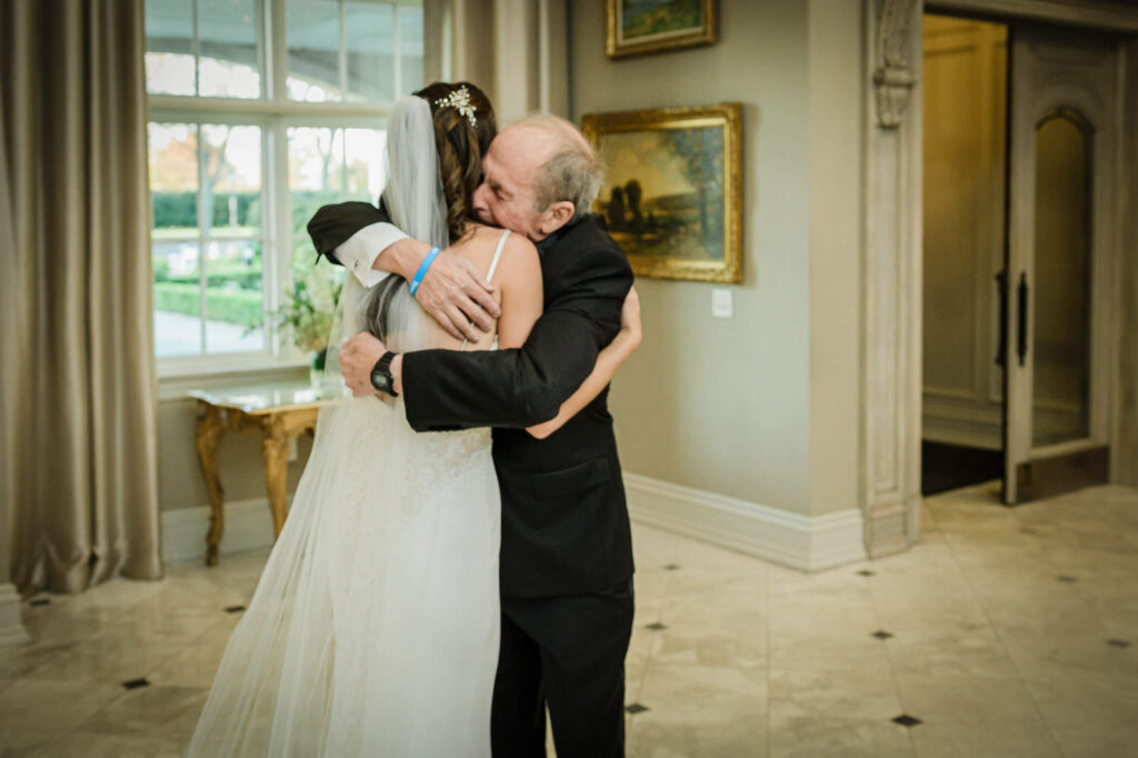 Emotional first look between bride and father at Park Chateau Estate wedding East Brunswick