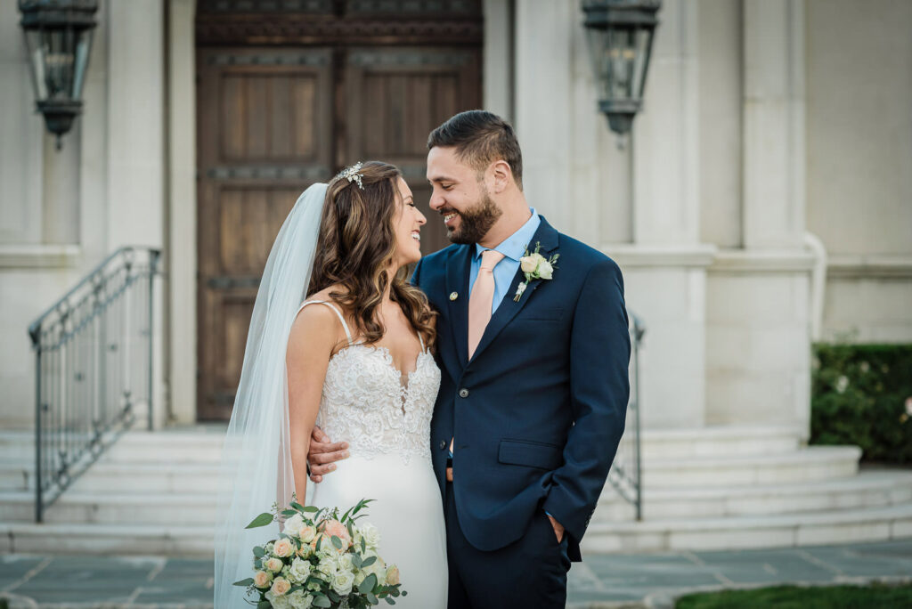 Bride and groom portrait at Park Chateau chapel during golden hour East Brunswick NJ