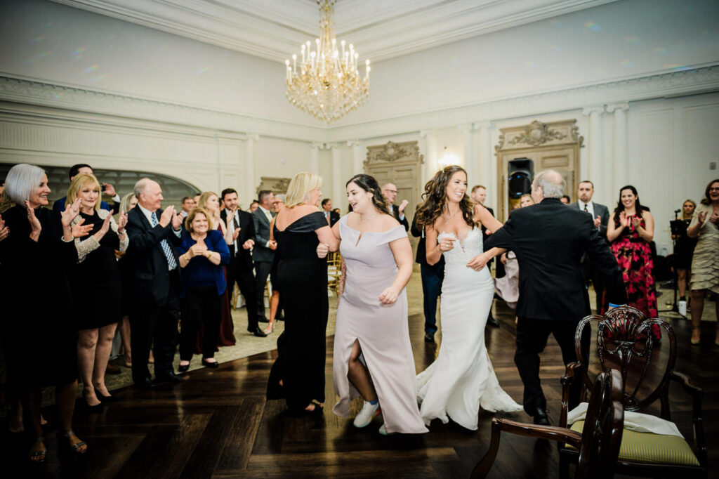 Jewish hora chair dance at Park Chateau Estate wedding reception East Brunswick NJ