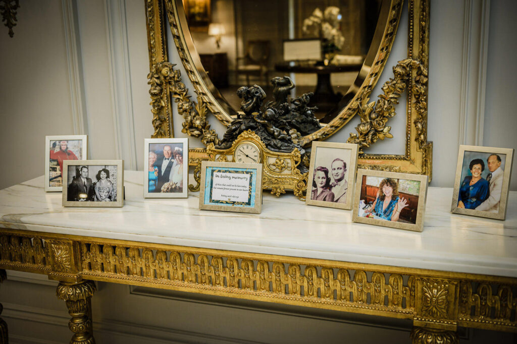 Family memory table with vintage photos at Park Chateau Estate wedding in East Brunswick NJ