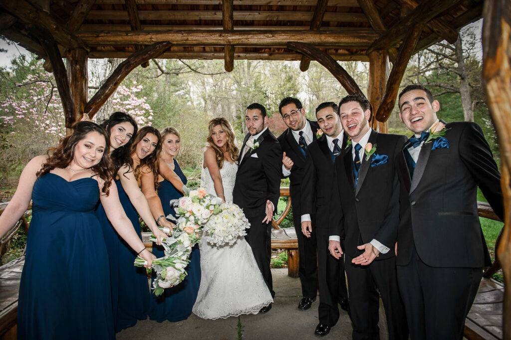 Bridal party portrait under gazebo at Rockleigh Country Club