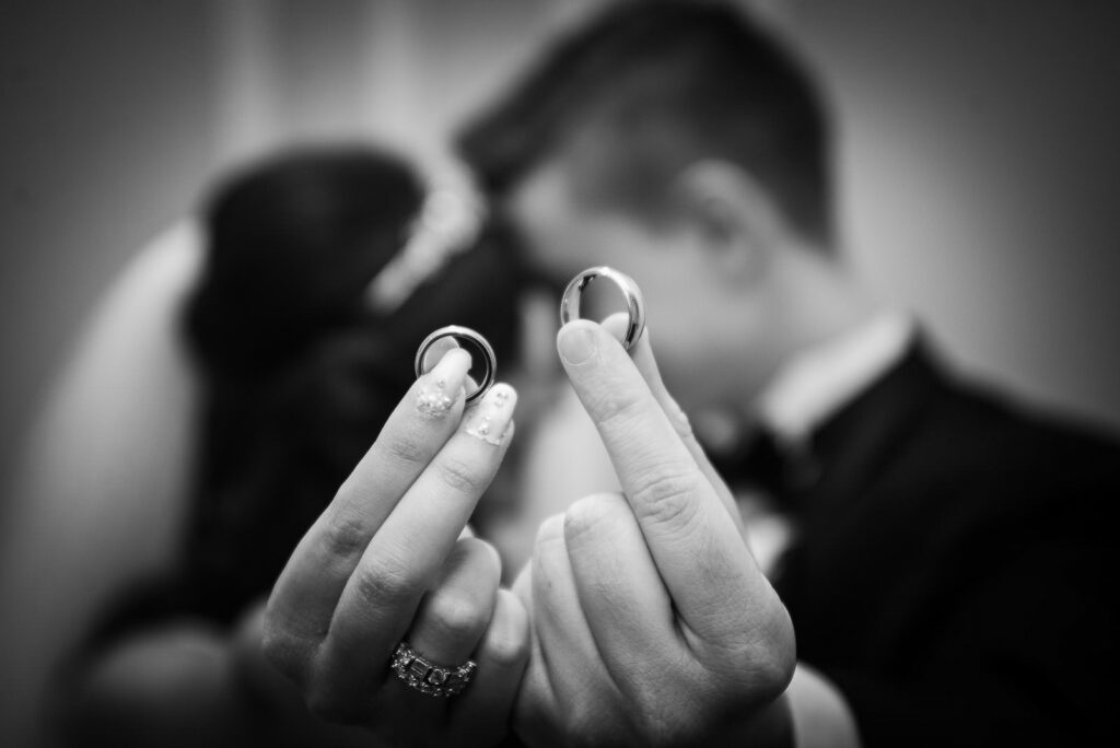 Romantic wedding portrait of couple by fountains at Rockleigh Country Club
