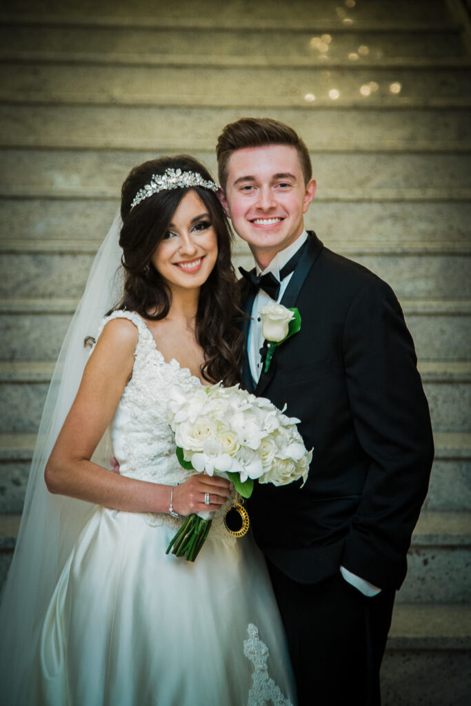 Bride and groom romantic portrait on staircase at Rockleigh Country Club in Bergen County