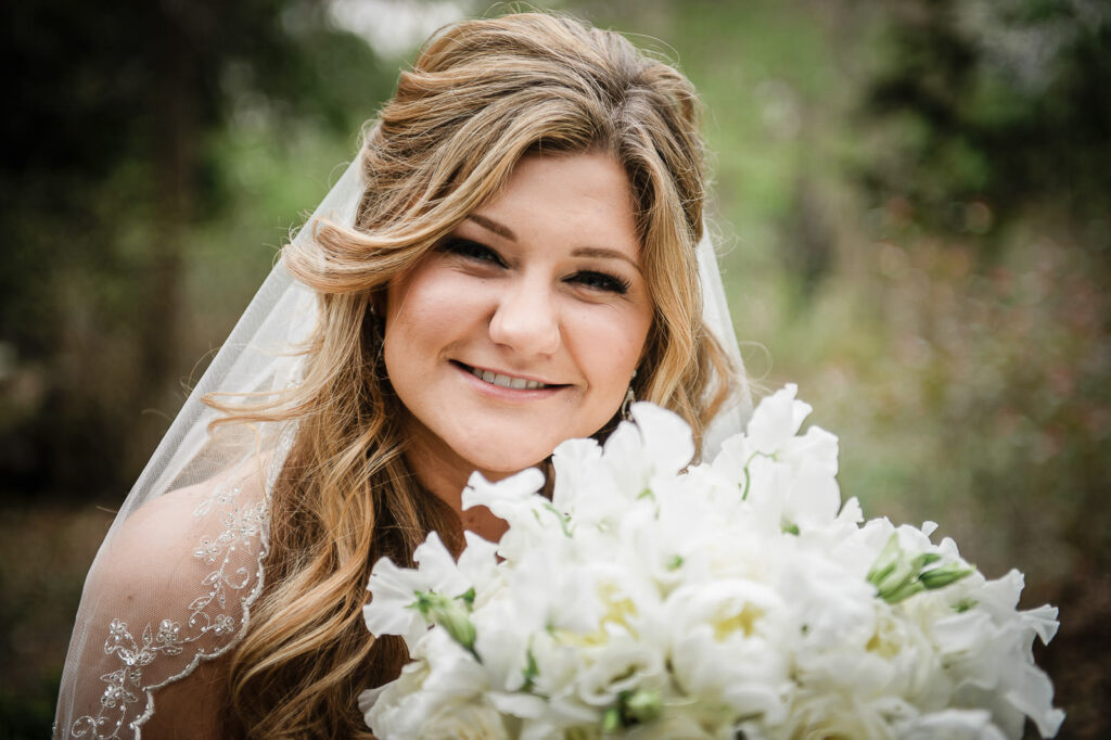Bride with floral bouquet at Rockleigh Country Club