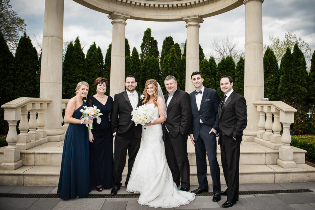 Groom family portrait at Rockleigh Country Club colonnade
