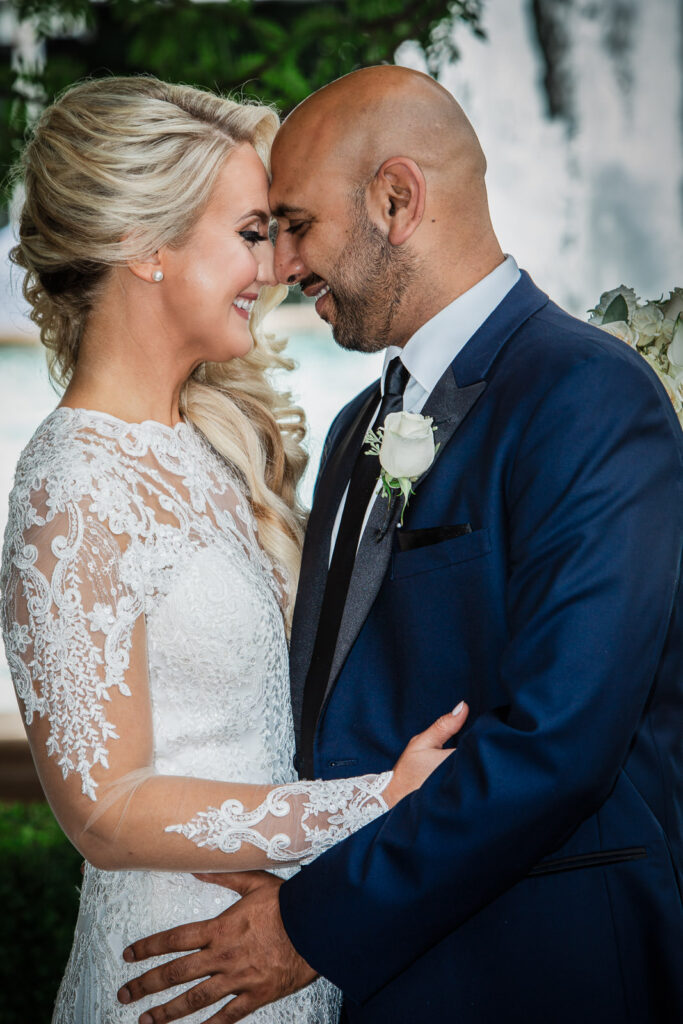 Bride and groom smiling during wedding ceremony at Rockleigh