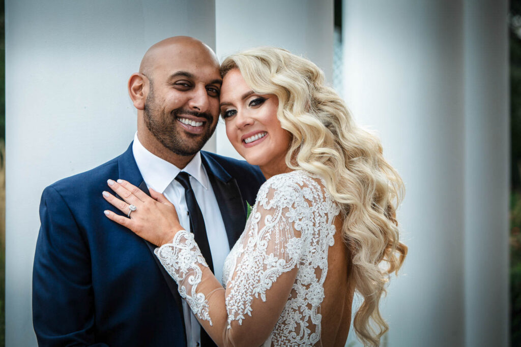 Bride and groom portrait in lush gardens at Rockleigh Country Club