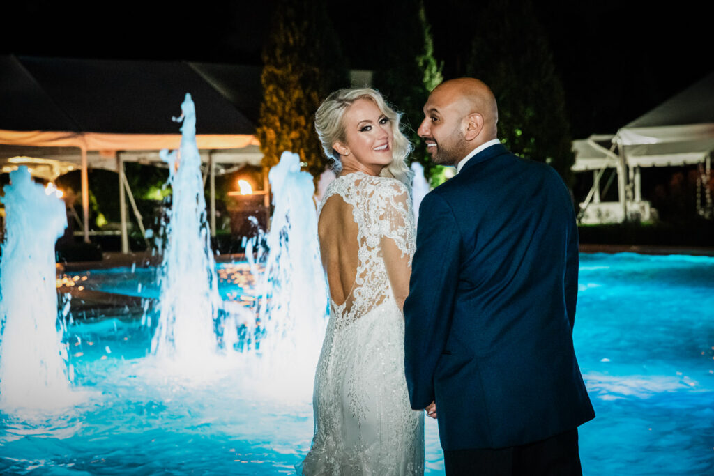 Nighttime fountain portraits at Rockleigh Country Club wedding