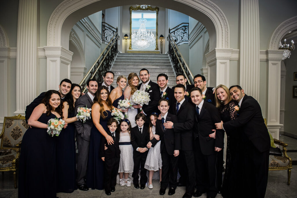 Wedding party on staircase at Rockleigh Country Club