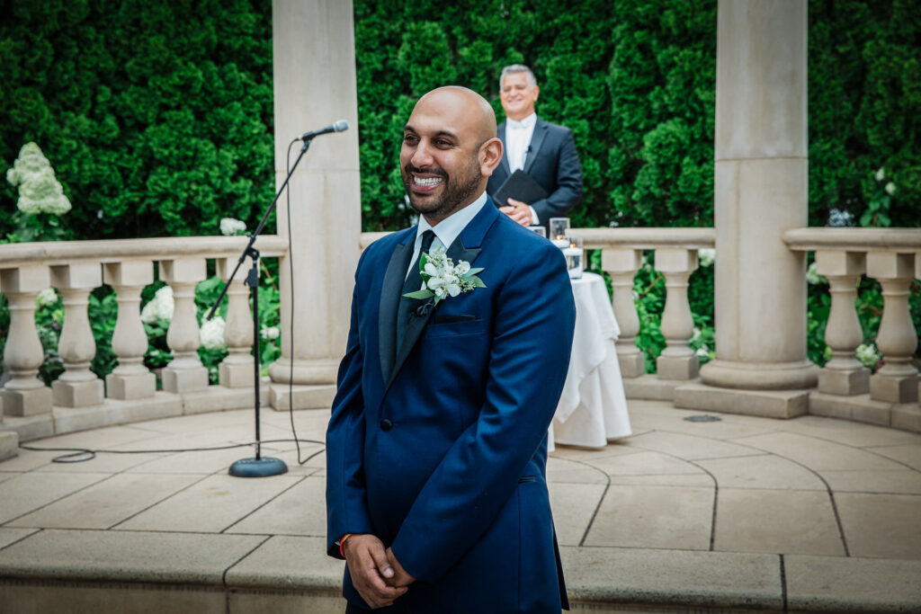 Romantic couple embrace in gardens at Rockleigh Country Club New Jersey