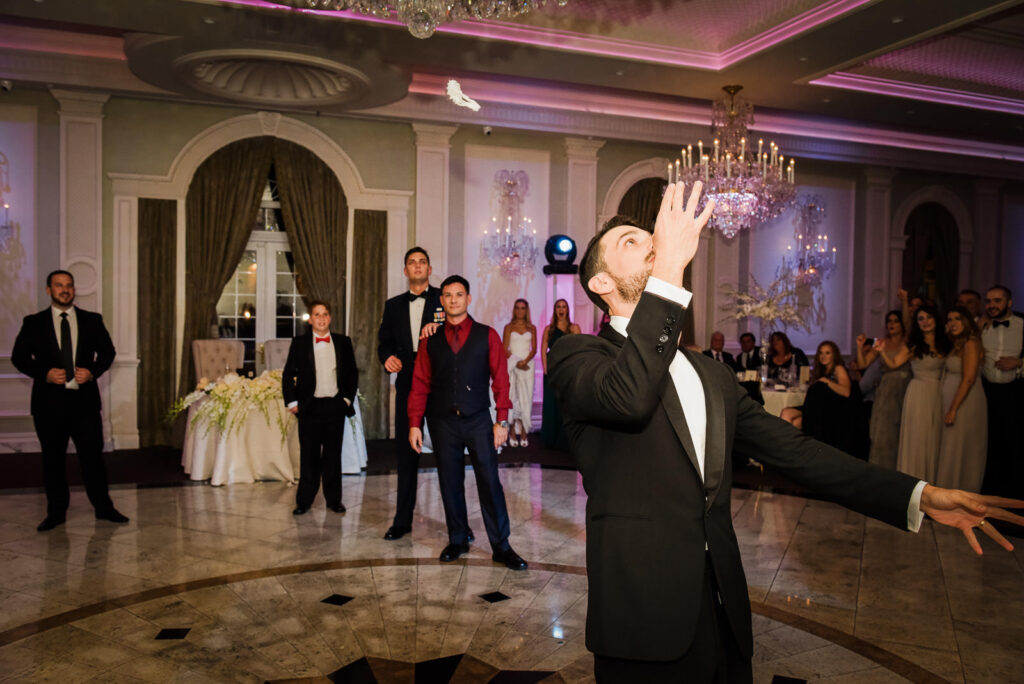 Groom garter toss Rockleigh Country Club reception