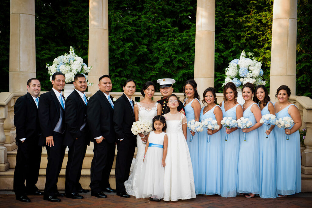 Emotional embrace between bride and Marine groom at Rockleigh Country Club reception