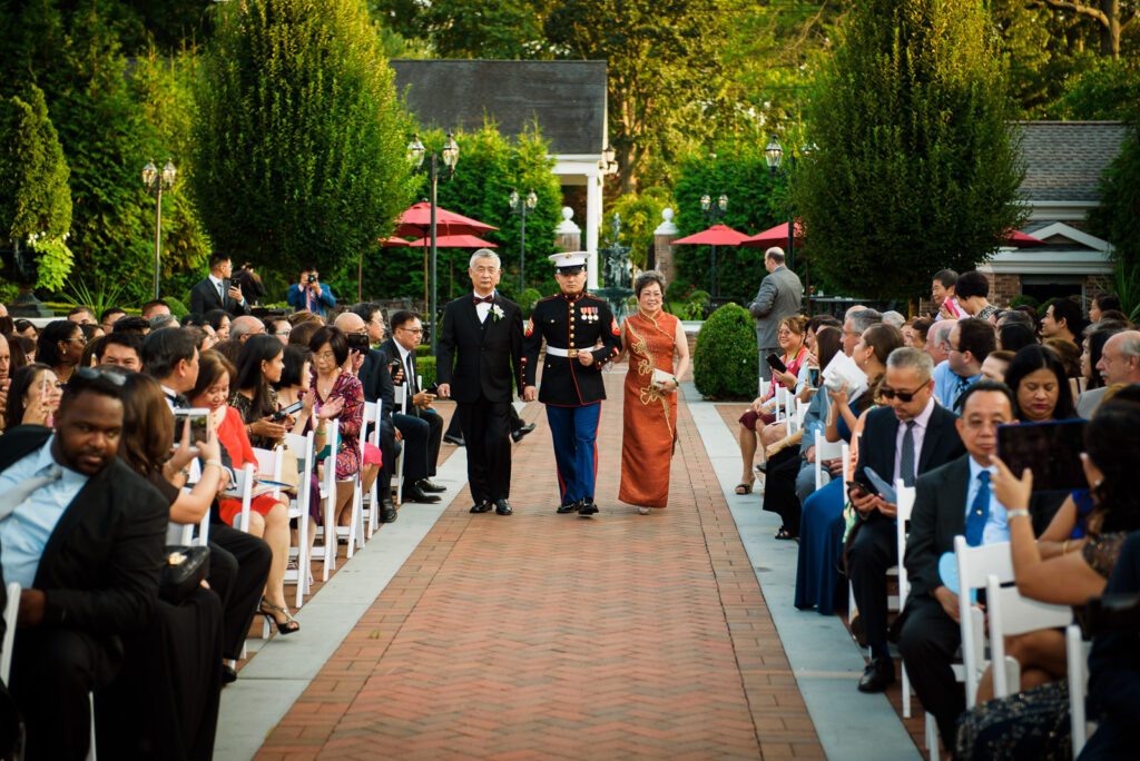 Complete wedding party with flower girls at Rockleigh Country Club colonnade