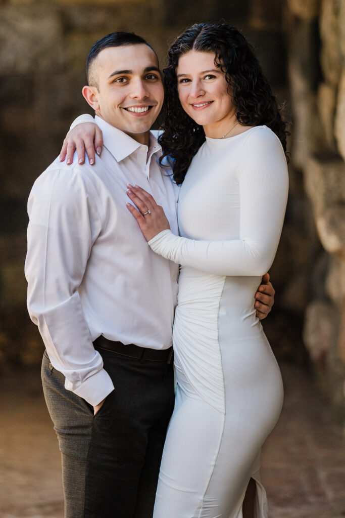 Joyful engagement portrait at Skylands Botanical Garden in winter, Ringwood, New Jersey