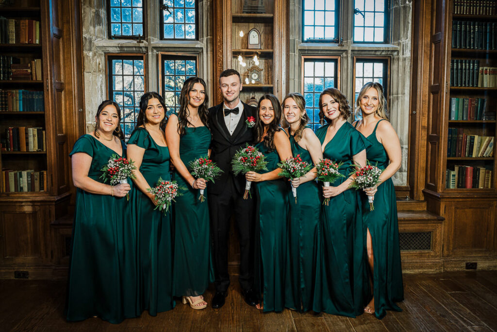 Groom with bridesmaids in Skylands Manor library
